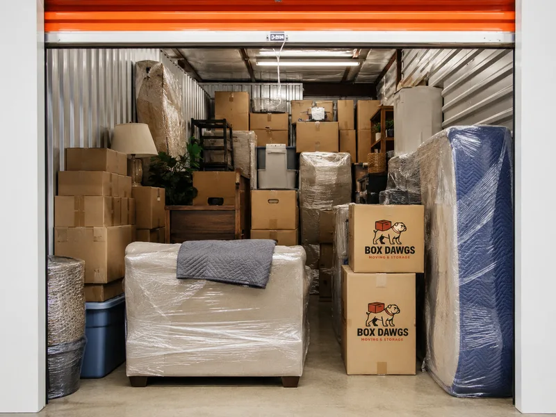 Packed Box Dawgs storage unit with branded boxes