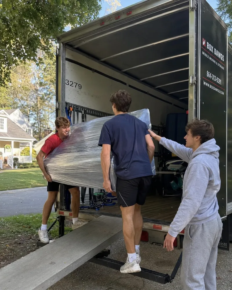 Box Dawgs crew loading the truck